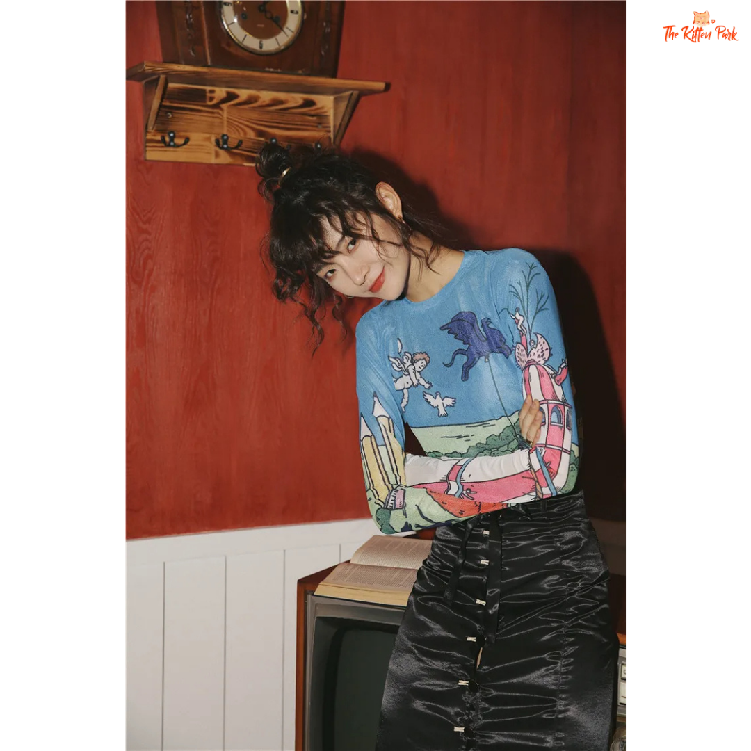 Women's slim-fit sheer mesh top with long sleeves and artistic hand-painted design, ideal for stylish layering in all-season streetwear.