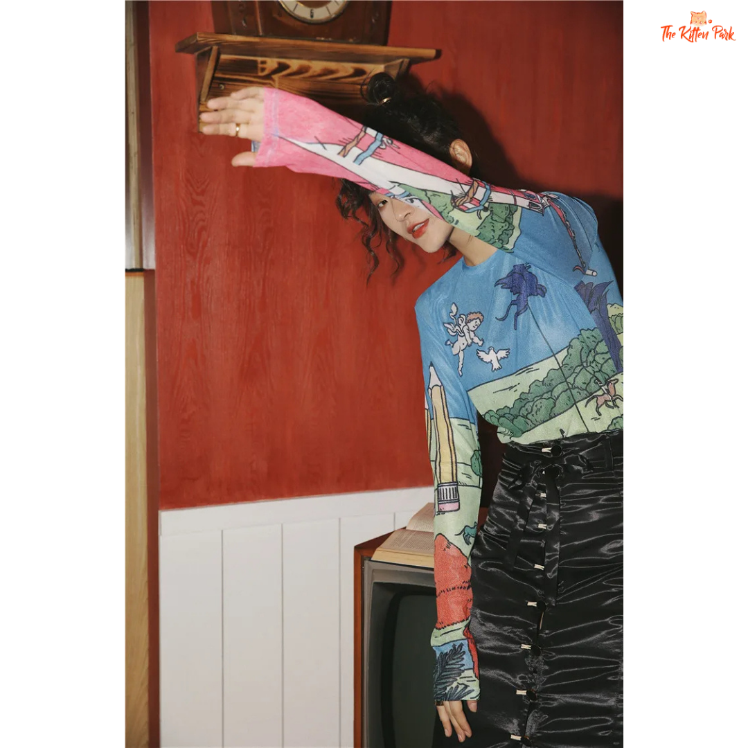 Women's slim-fit sheer mesh top with long sleeves and artistic hand-painted design, ideal for stylish layering in all-season streetwear.