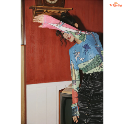 Women's slim-fit sheer mesh top with long sleeves and artistic hand-painted design, ideal for stylish layering in all-season streetwear.