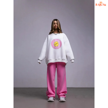 A women’s oversized cotton pullover sweatshirt with hooded collar, drop sleeves, and print design, styled for autumn/winter casual wear.