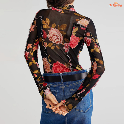 Slim-fit floral mesh top with mock neck and full sleeves, blending Y2K aesthetics and fairycore charm for dreamy summer layering.
