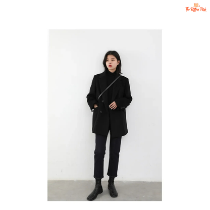 Black wool blend mid-length blazer coat for women with single button closure, office-lady style, and elegant winter outerwear design.