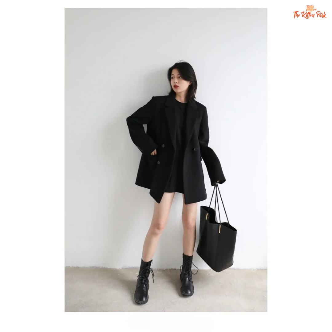 Black wool blend mid-length blazer coat for women with single button closure, office-lady style, and elegant winter outerwear design.