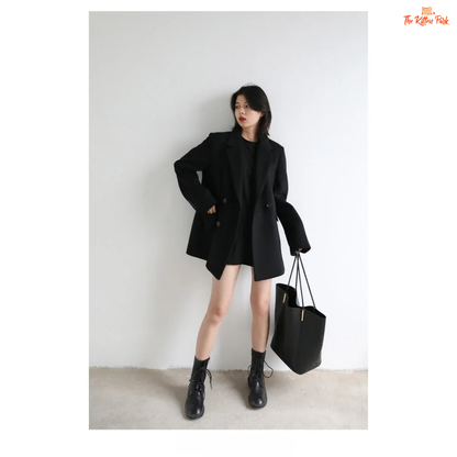 Black wool blend mid-length blazer coat for women with single button closure, office-lady style, and elegant winter outerwear design.