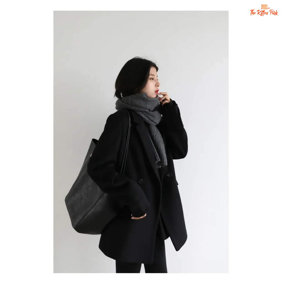 Black wool blend mid-length blazer coat for women with single button closure, office-lady style, and elegant winter outerwear design.