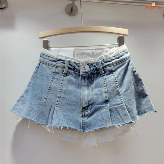 High-waisted irregular A-line denim mini skirt with a fake two-piece design, perfect for casual autumn and winter outfits.
