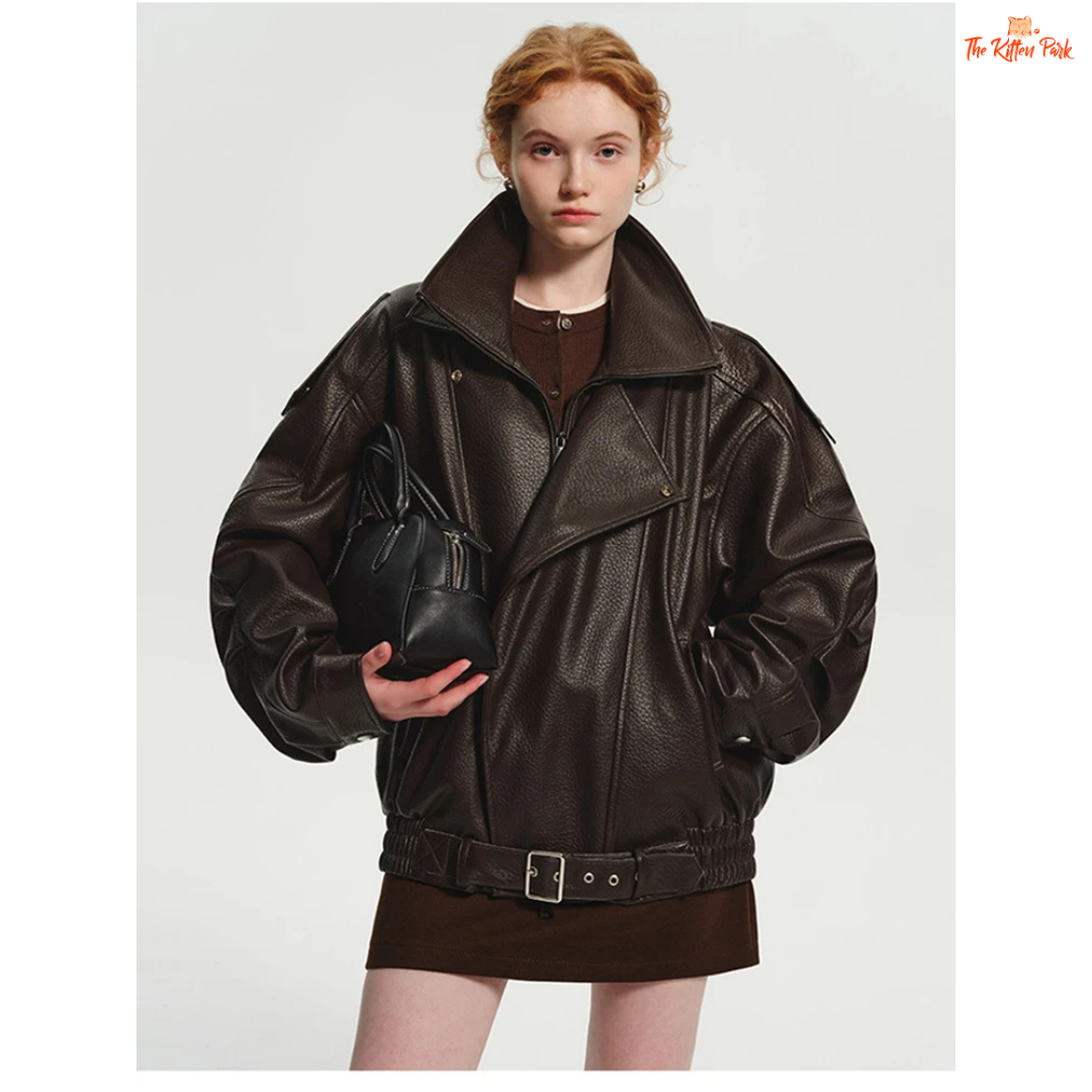 Women's oversized brown PU leather jacket with retro zip-up design, mandarin collar, and pockets — stylish high street coat for all seasons.