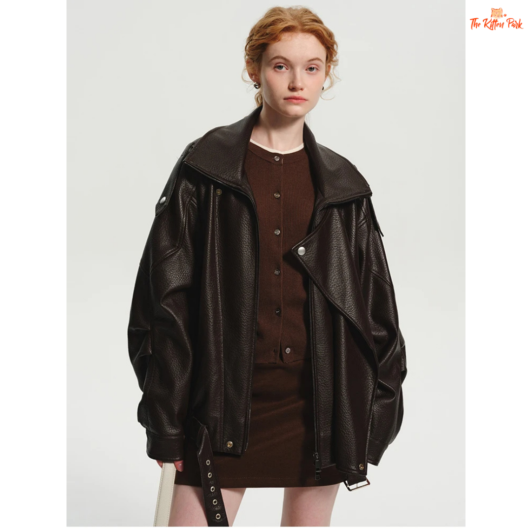 Women's oversized brown PU leather jacket with retro zip-up design, mandarin collar, and pockets — stylish high street coat for all seasons.