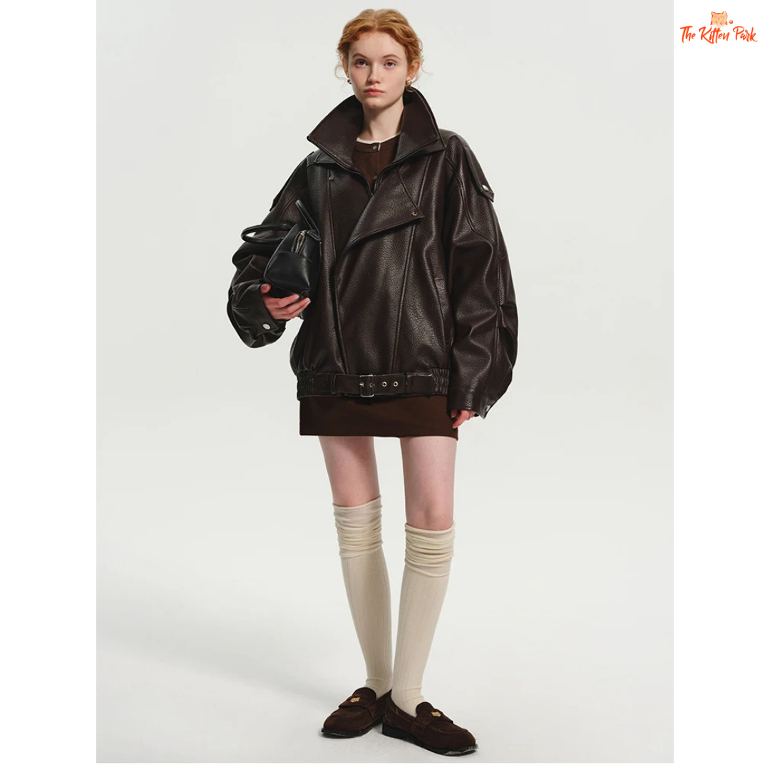 Women's oversized brown PU leather jacket with retro zip-up design, mandarin collar, and pockets — stylish high street coat for all seasons.
