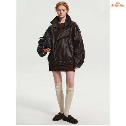 Women's oversized brown PU leather jacket with retro zip-up design, mandarin collar, and pockets — stylish high street coat for all seasons.