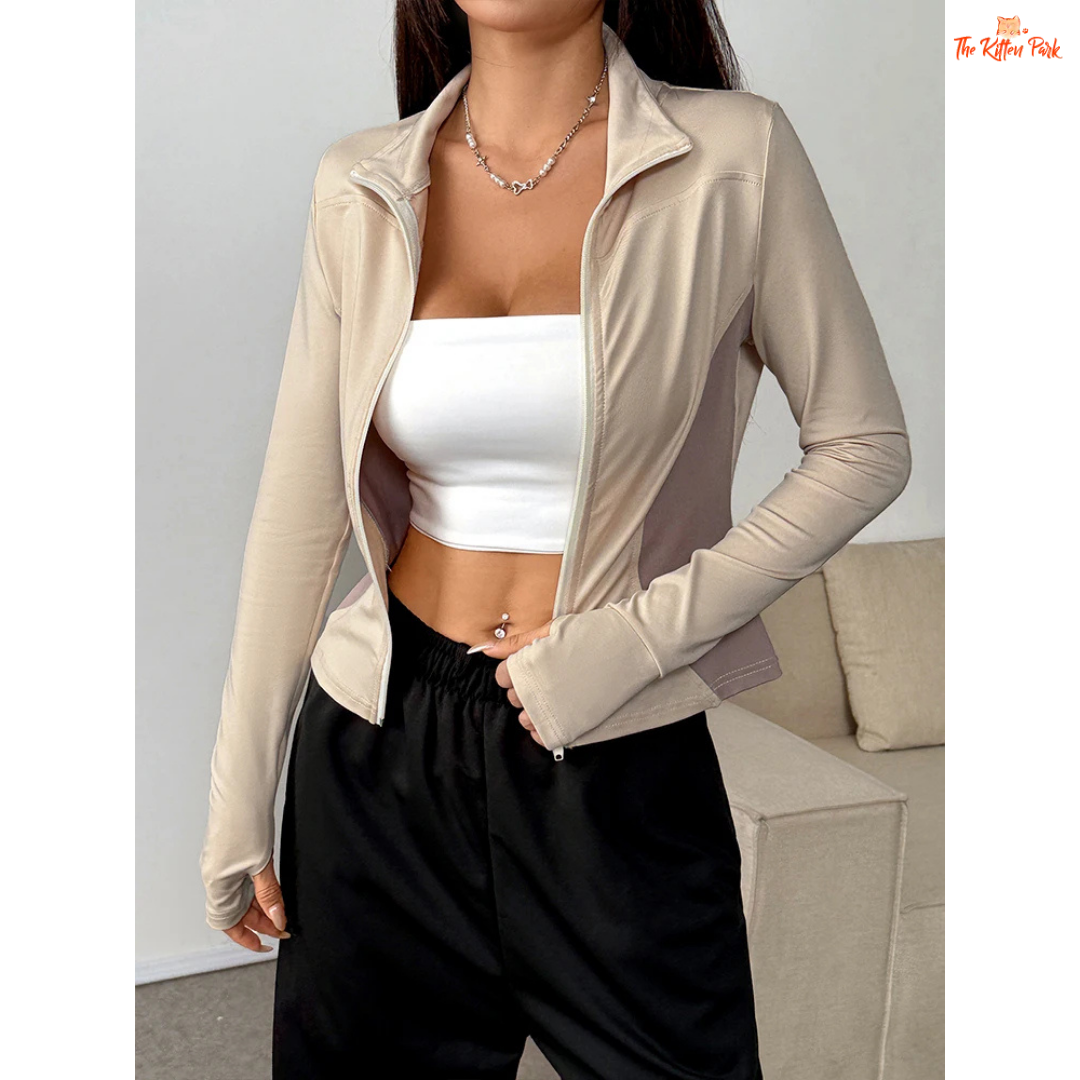 A cream patchwork zipper coat for women featuring a turn-down collar, thick fabric, hollow-out accents, and casual streetwear autumn design.
