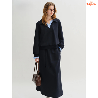 Woman wearing a black outfit with a white background