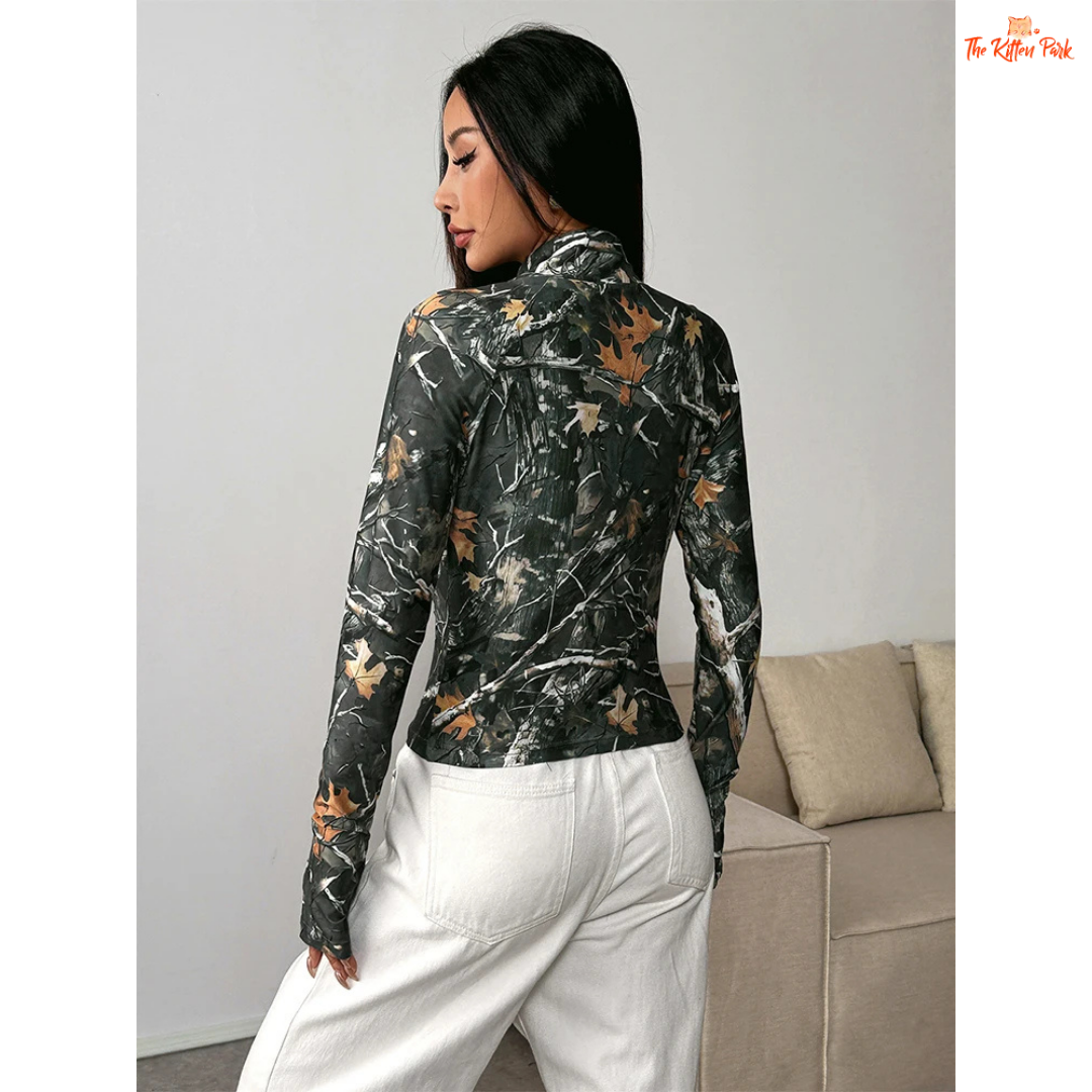 A dark green printed turtleneck zipper sports coat for women featuring a slim fit, hollow-out accents, and turn-down collar for chic autumn activewear style.