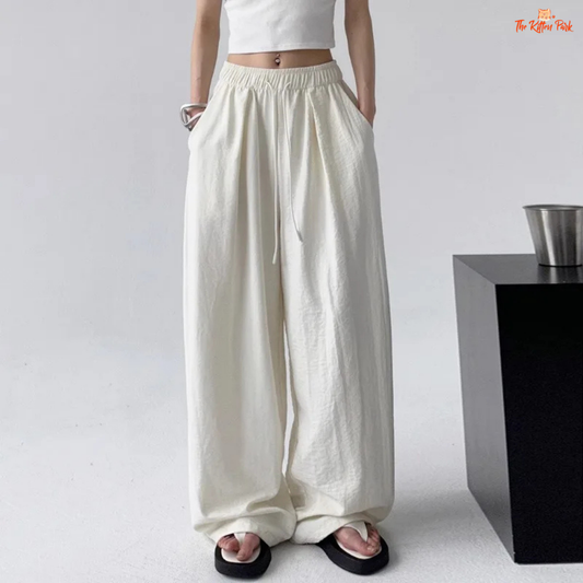 Lightweight ice silk wide-leg women's sweatpants with high waist and drawstring closure, designed in Korean style for summer comfort and relaxed fit.