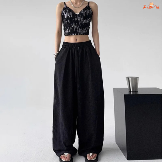 Lightweight ice silk wide-leg women's sweatpants with high waist and drawstring closure, designed in Korean style for summer comfort and relaxed fit.