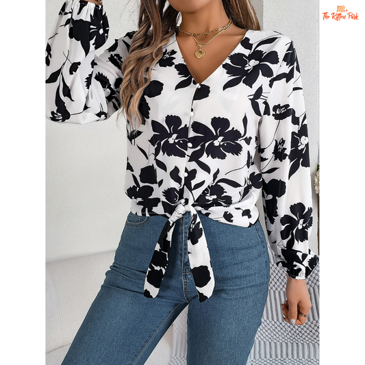 Elegant floral chiffon shirt with lace-up detailing, long sleeves, and soft fabric, ideal for casual spring and summer wear.