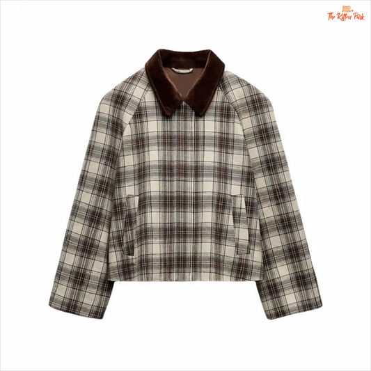 A women’s retro plaid cape jacket with a polo collar, wide-waisted fit, zipper closure, and French-inspired casual spring style.