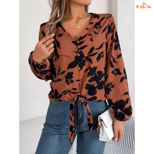 Elegant floral chiffon shirt with lace-up detailing, long sleeves, and soft fabric, ideal for casual spring and summer wear.