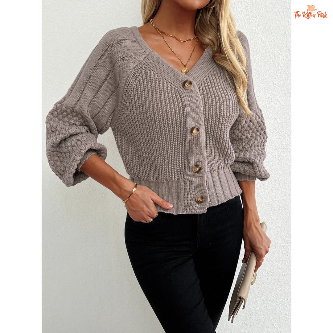 Women’s Raglan Sleeve Knit Cardigan featuring lantern sleeves, button details, and open-stitch V-neck in camel brown acrylic knit for autumn and winter wear.