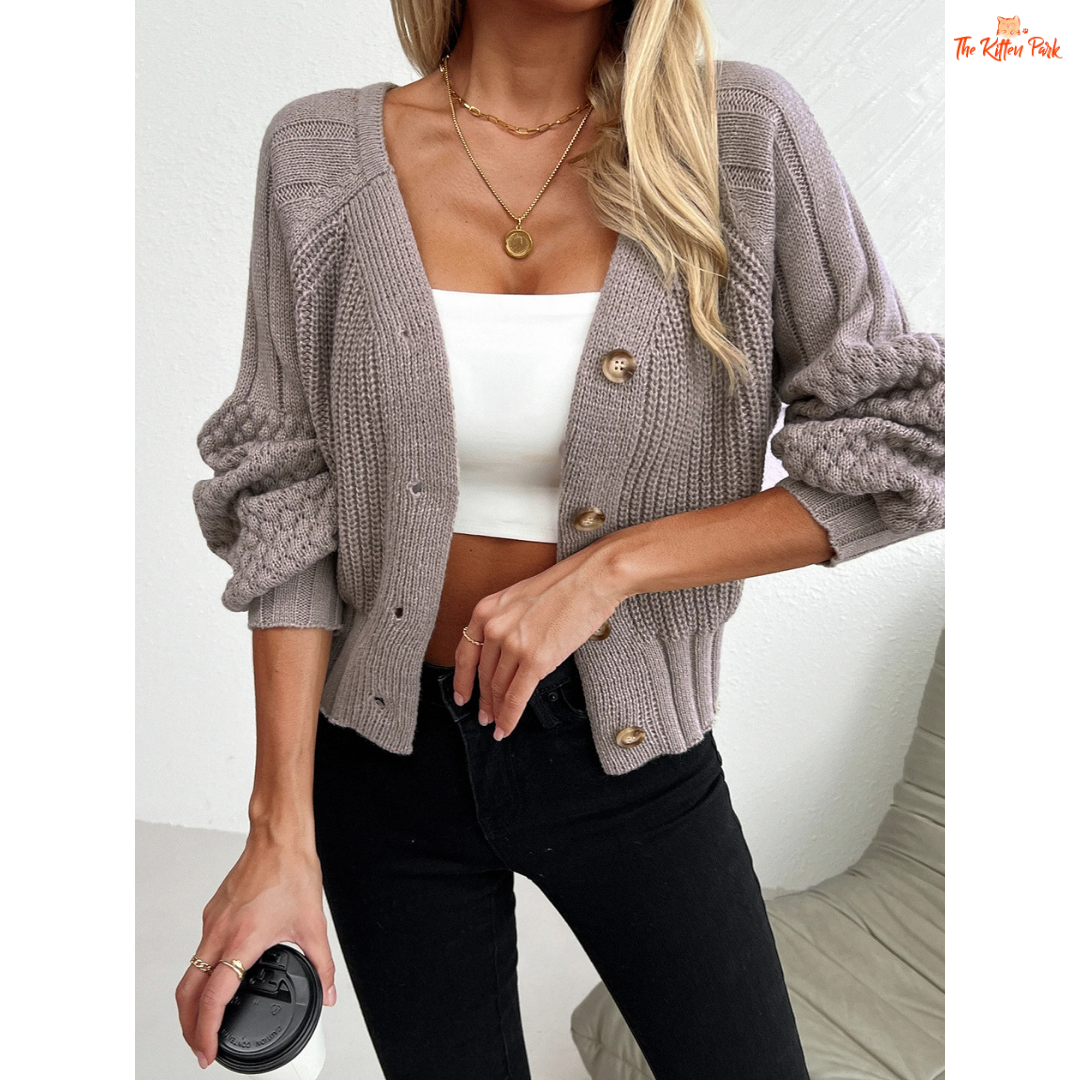 Women’s Raglan Sleeve Knit Cardigan featuring lantern sleeves, button details, and open-stitch V-neck in camel brown acrylic knit for autumn and winter wear.