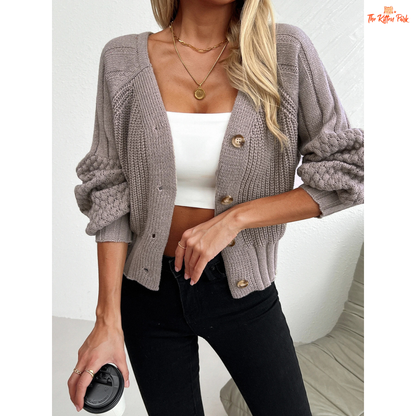 Women’s Raglan Sleeve Knit Cardigan featuring lantern sleeves, button details, and open-stitch V-neck in camel brown acrylic knit for autumn and winter wear.