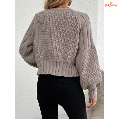 Women’s Raglan Sleeve Knit Cardigan featuring lantern sleeves, button details, and open-stitch V-neck in camel brown acrylic knit for autumn and winter wear.