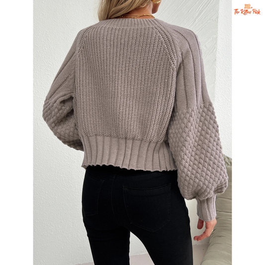 Women’s Raglan Sleeve Knit Cardigan featuring lantern sleeves, button details, and open-stitch V-neck in camel brown acrylic knit for autumn and winter wear.