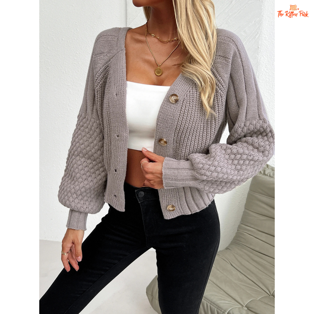 Women’s Raglan Sleeve Knit Cardigan featuring lantern sleeves, button details, and open-stitch V-neck in camel brown acrylic knit for autumn and winter wear.