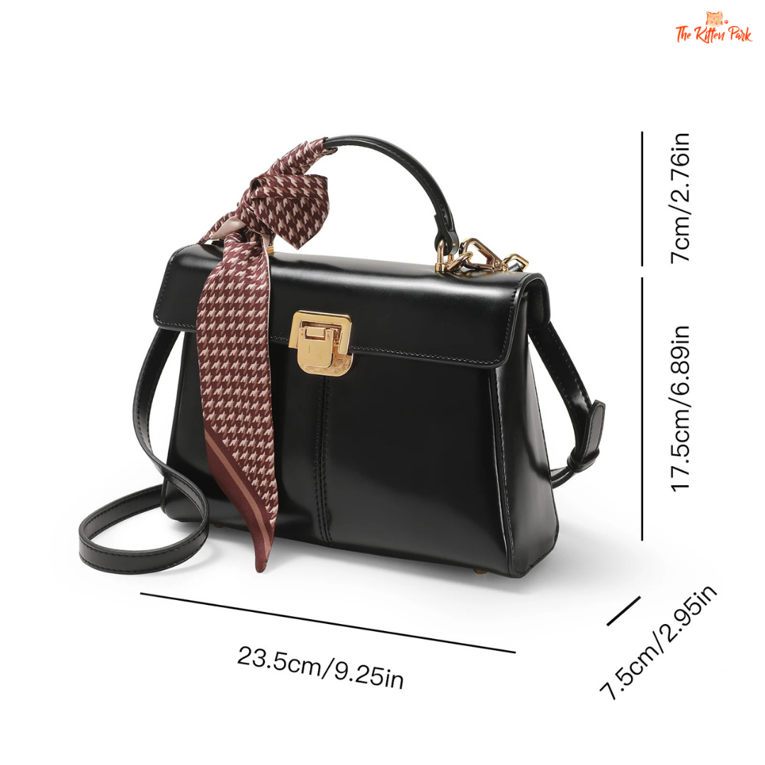 Soft split leather women’s square crossbody bag featuring elegant scarf decor, hasp closure, and fashion-forward minimalist design.
