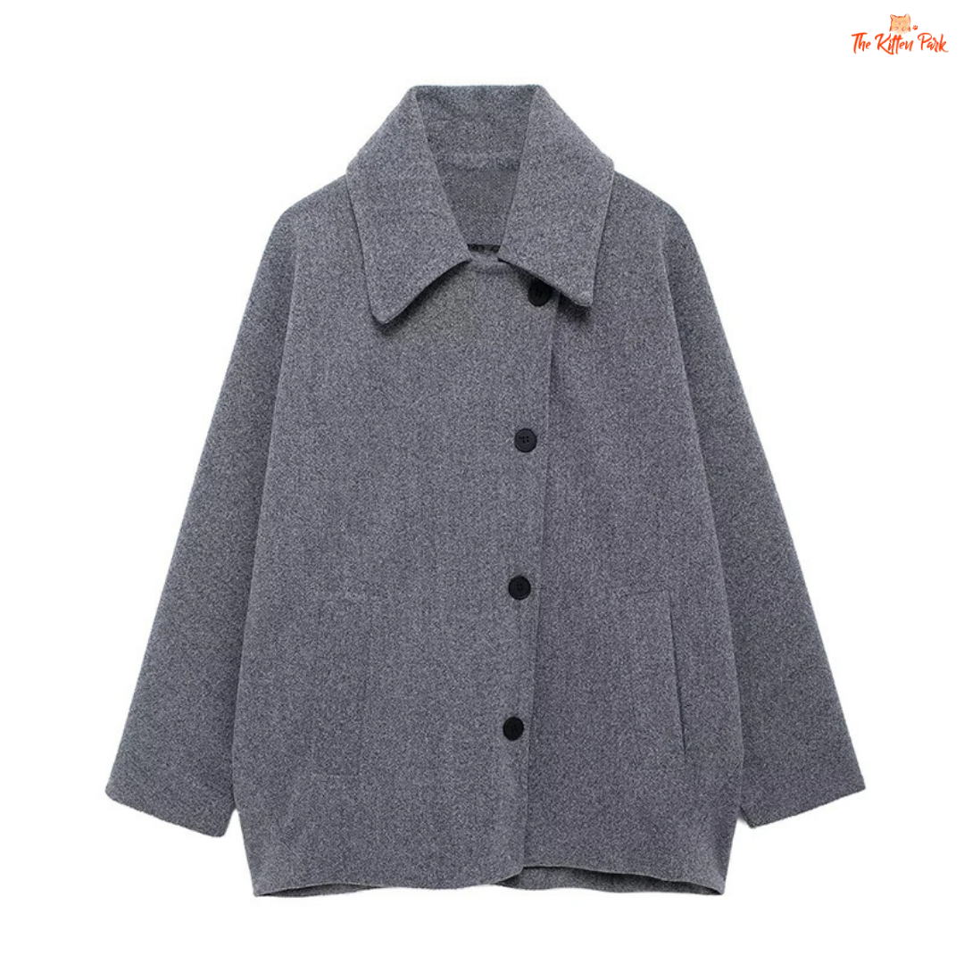 A women’s solid color lapel jacket in beige with single-breasted closure, loose fit, and casual long-sleeve design for autumn and winter wear.