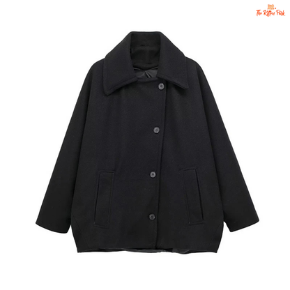 A women’s solid color lapel jacket in beige with single-breasted closure, loose fit, and casual long-sleeve design for autumn and winter wear.