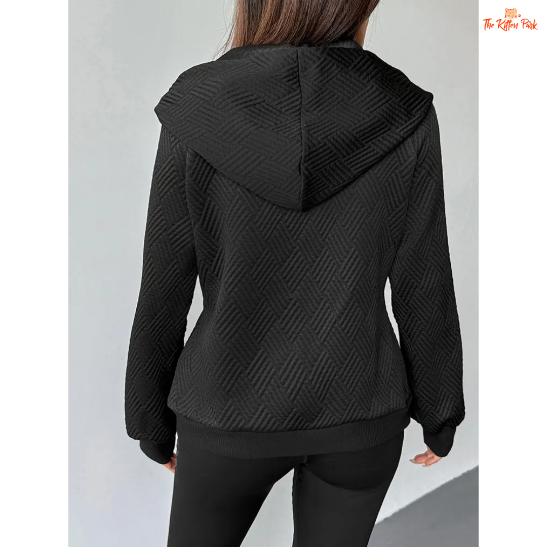 A modern women’s zip-up streetwear top featuring a hood, wool-lined interior, and sleek sporty design