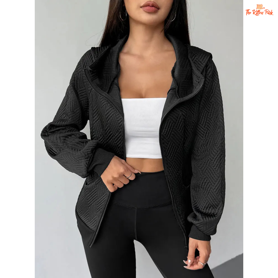 A modern women’s zip-up streetwear top featuring a hood, wool-lined interior, and sleek sporty design