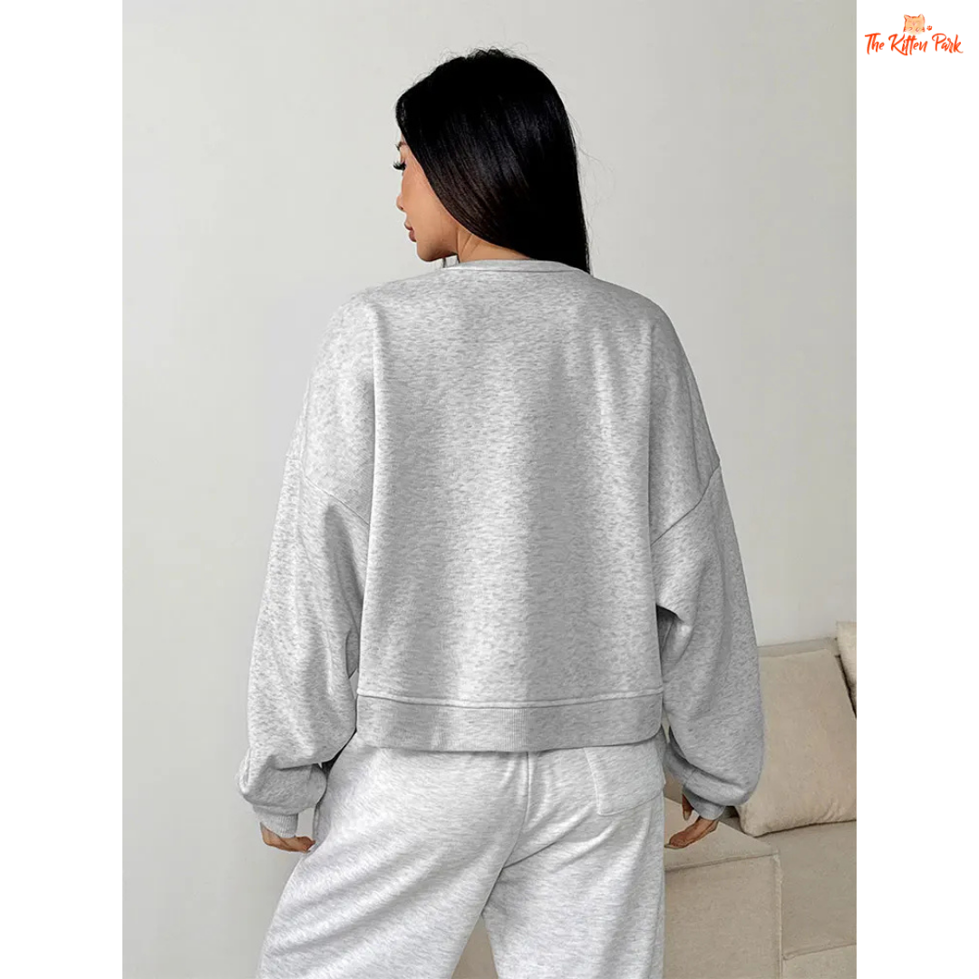 A slim-fit women’s pullover hoodie featuring an O-neck design, wool-lined interior, and soft knit texture