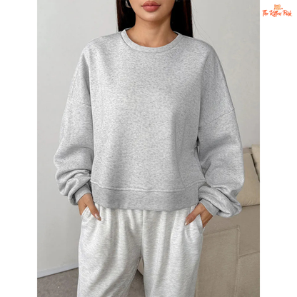 A slim-fit women’s pullover hoodie featuring an O-neck design, wool-lined interior, and soft knit texture