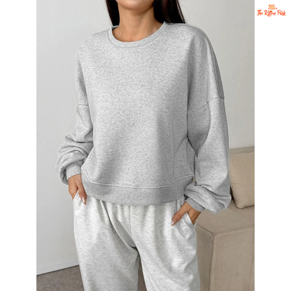 A slim-fit women’s pullover hoodie featuring an O-neck design, wool-lined interior, and soft knit texture