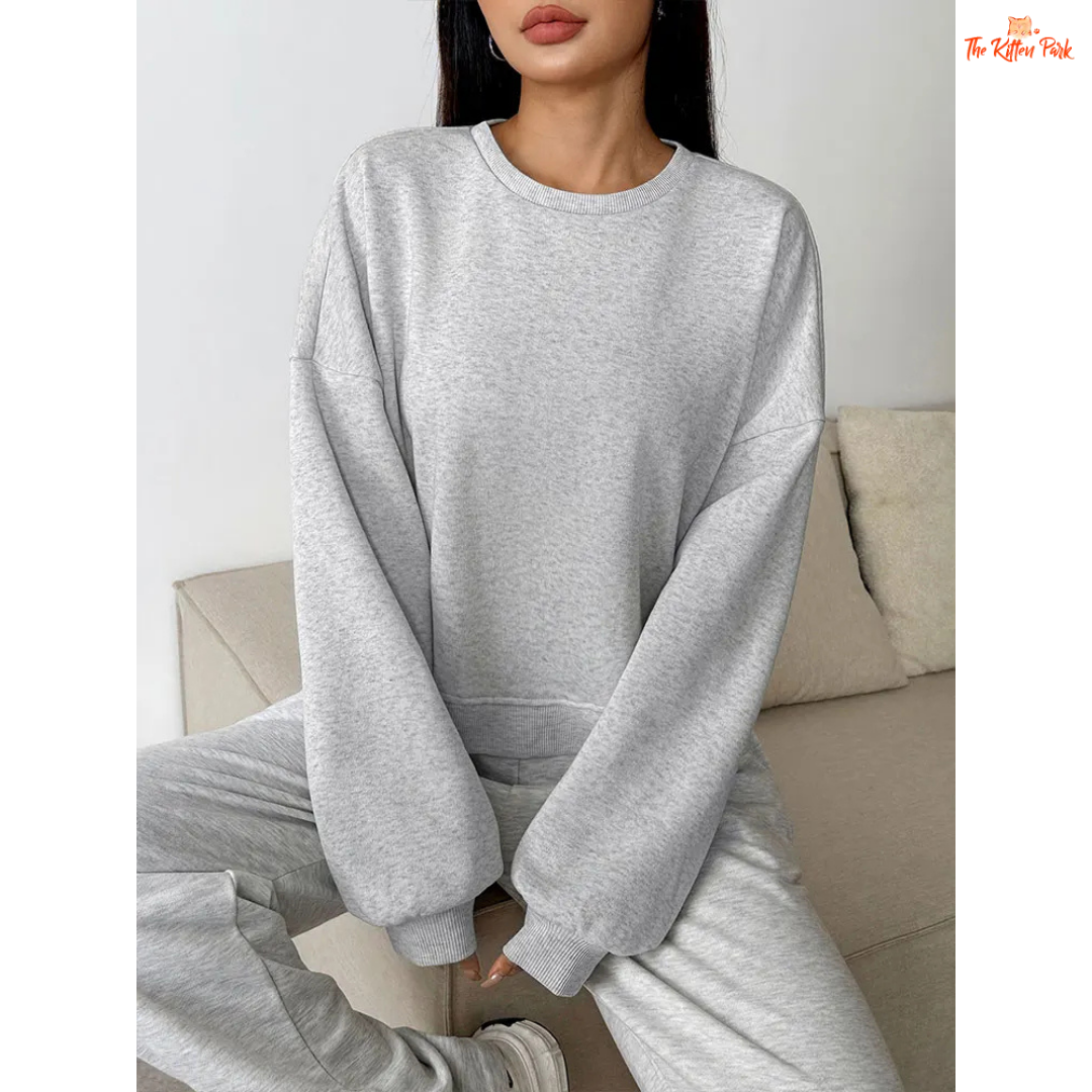 A slim-fit women’s pullover hoodie featuring an O-neck design, wool-lined interior, and soft knit texture