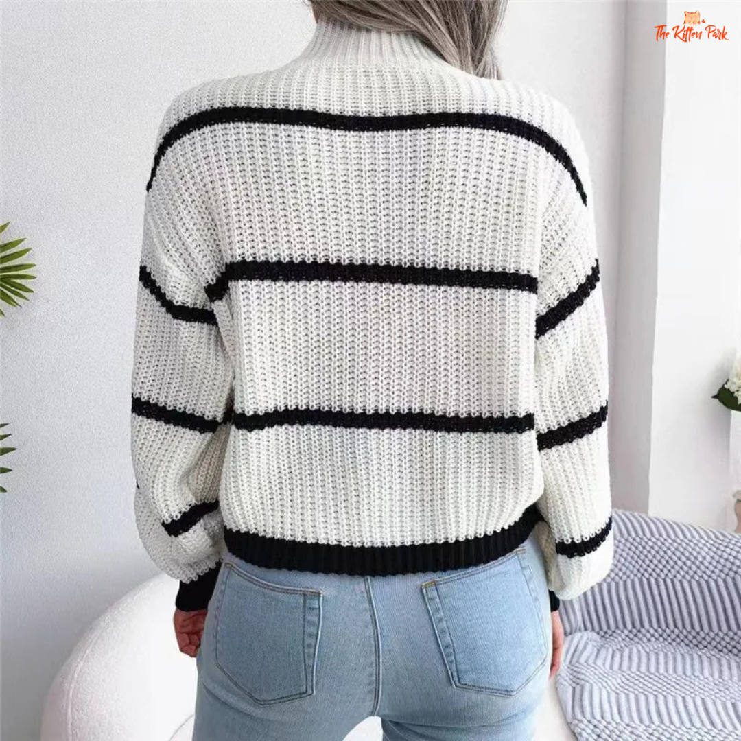 Striped lantern sleeve knit sweater with mock neck and relaxed fit, designed for autumn and winter streetwear style in off-white background.