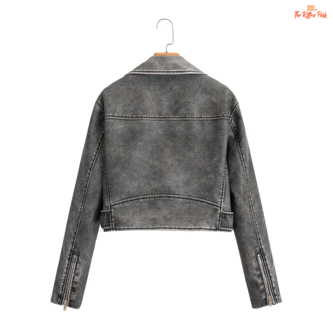 A women's faux PU leather moto jacket with a vintage short cut, full zipper closure, turn-down collar, and casual all-season style in solid color.