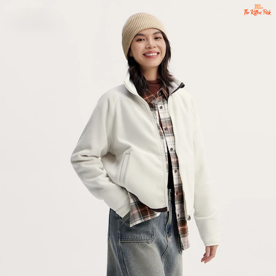 A women’s polar fleece winter coat with a stand collar, antistatic fabric, loose fit, zipper closure, and casual warm style.