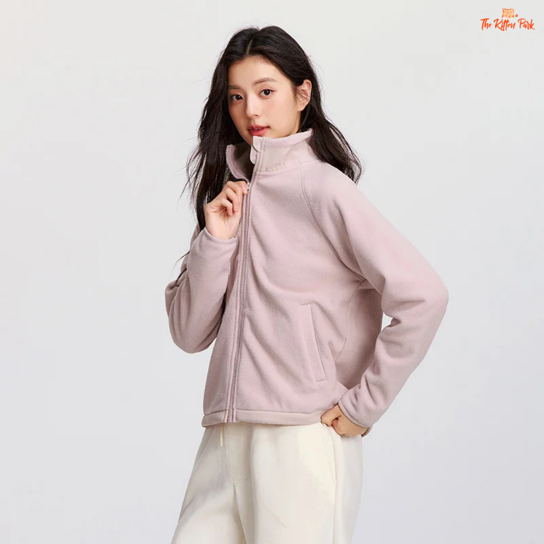 A women’s polar fleece winter coat with a stand collar, antistatic fabric, loose fit, zipper closure, and casual warm style.