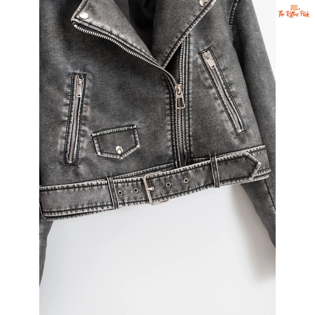 A women's faux PU leather moto jacket with a vintage short cut, full zipper closure, turn-down collar, and casual all-season style in solid color.