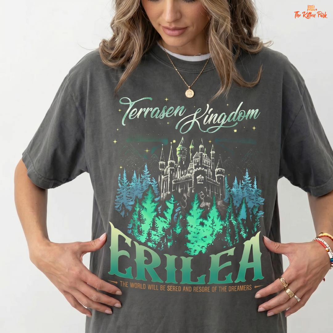 Person wearing a t-shirt with 'Terrasen Kingdom Erilea' design on a plain background