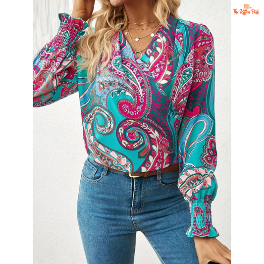 Women's V-neck paisley print chiffon blouse with pleated sleeves, ideal for spring and summer casual outfits.