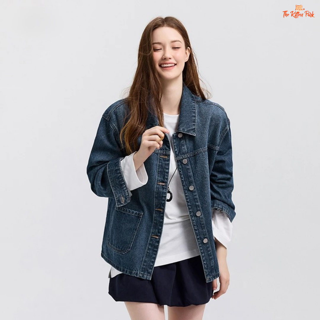 A women’s casual elegant denim jacket with a loose fit, lapel turn-down collar, drop shoulders, full sleeves, and pockets – ideal for spring wear.