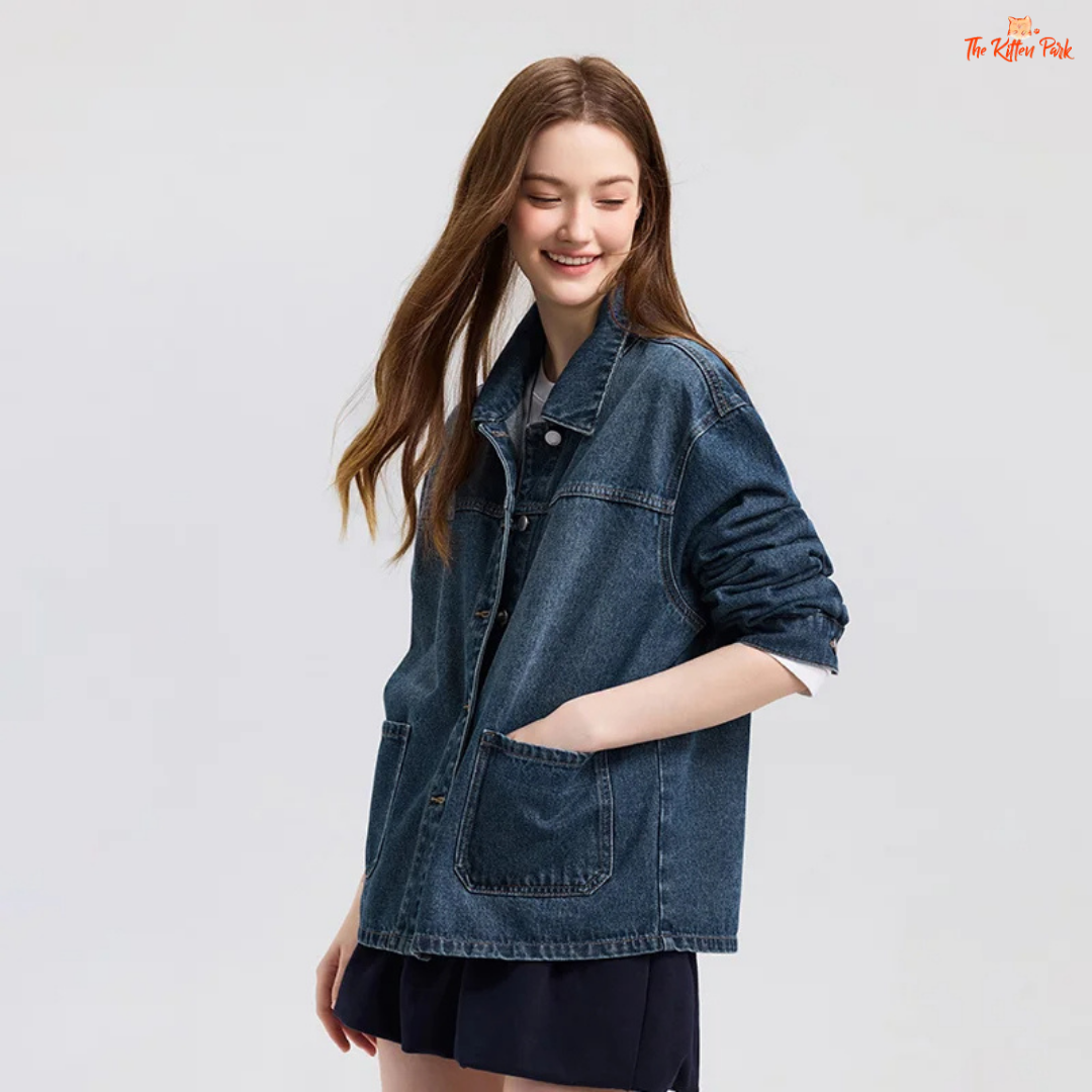 A women’s casual elegant denim jacket with a loose fit, lapel turn-down collar, drop shoulders, full sleeves, and pockets – ideal for spring wear.