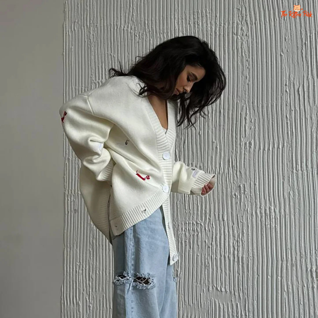 V-Neck Cardigan for Women – Elegant Single-Breasted Knit Sweater 2026 Autumn with printed knit fabric, button closure, and casual loose fit.