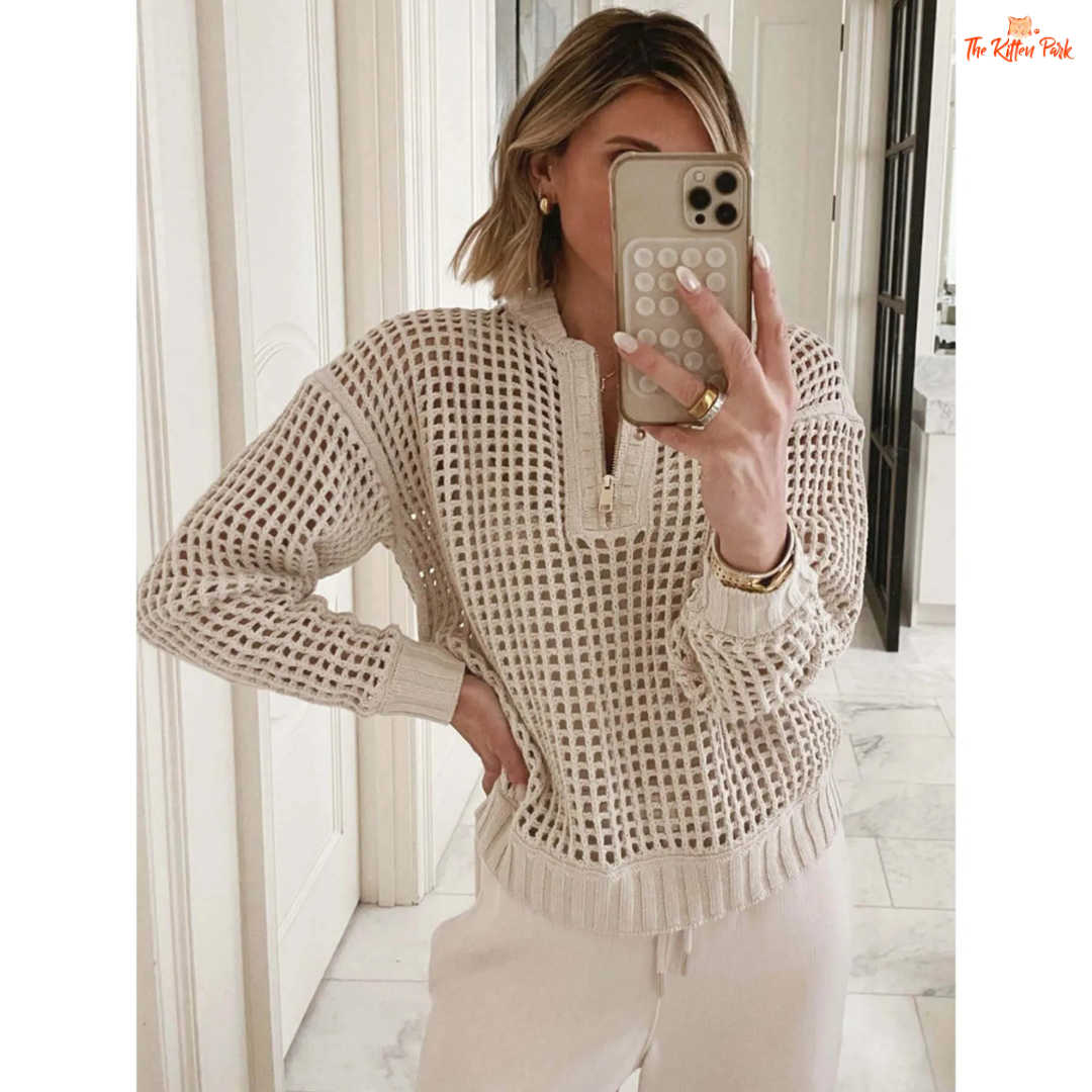 Beige V-neck hollow-out knit sweater with zipper front, loose fit and stylish streetwear design for women.
