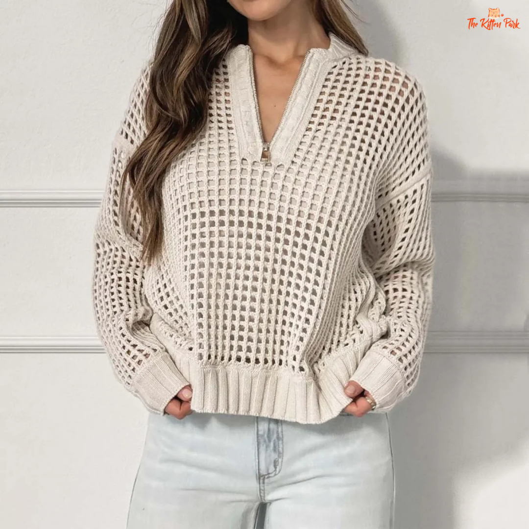 Beige V-neck hollow-out knit sweater with zipper front, loose fit and stylish streetwear design for women.