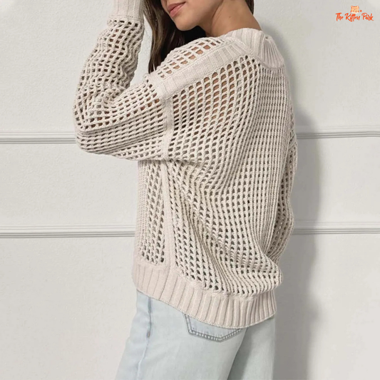 Beige V-neck hollow-out knit sweater with zipper front, loose fit and stylish streetwear design for women.